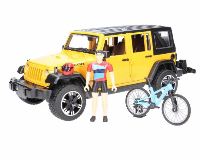 Bruder Jeep Wrangler Rubicon s cyklistou a kolem