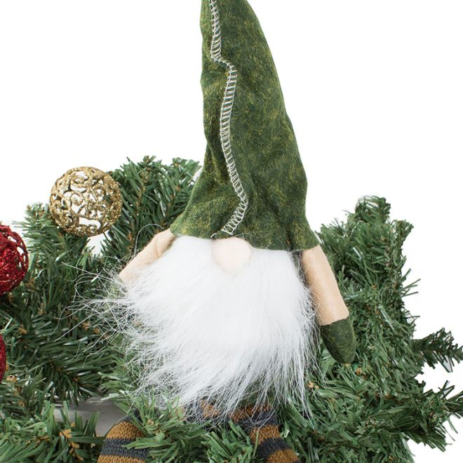 Santa gnome Vánoční skřítek pod vánočním stromkem