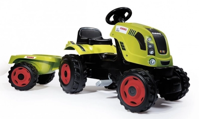 Šlapací traktor CLAAS Arion 400 s vozíkem zelený