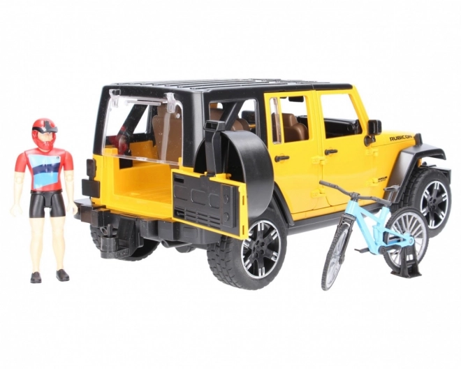 Bruder Jeep Wrangler Rubicon s cyklistou a kolem