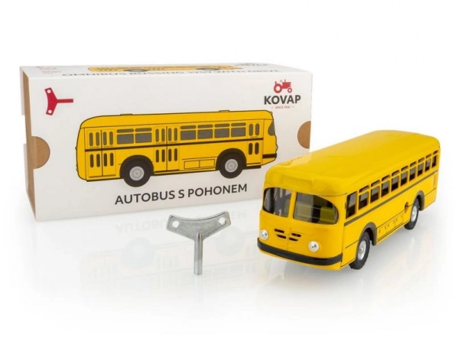 Autobus retro na klíček kov 19cm žlutý v krabičce Kovap