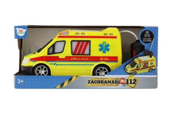 Auto RC ambulance plast 20cm na dálkové ovládání 27MHz na baterie se světlem v krabici 28x13x11cm