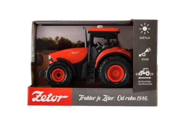 Červený traktor Zetor na setrvačník se zvukovými a světlenými efekty