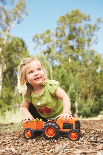 Green Toys Traktor s vlečkou oranžový